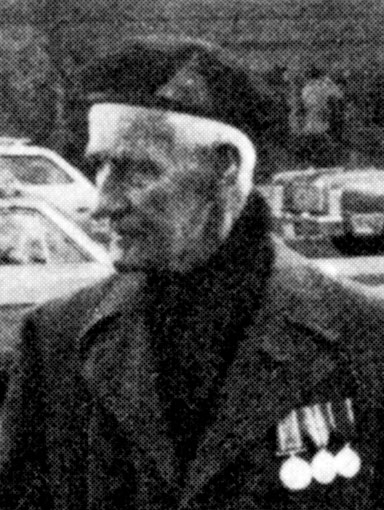 First World War amputee veteran Jack Balchin wearing his military medals.