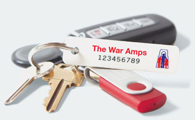 A set of keys with a War Amps key tag attached. Order key tags.